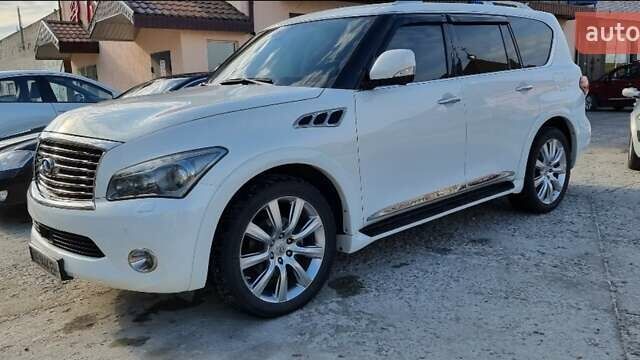 Белый Инфинити QX56, объемом двигателя 5.55 л и пробегом 127 тыс. км за 21000 $, фото 1 на Automoto.ua
