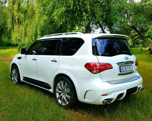 Белый Инфинити QX56, объемом двигателя 5.55 л и пробегом 148 тыс. км за 26950 $, фото 1 на Automoto.ua