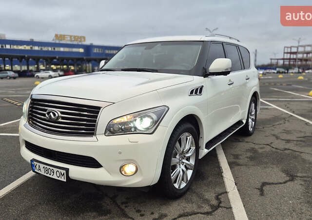 Белый Инфинити QX56, объемом двигателя 5.55 л и пробегом 246 тыс. км за 18300 $, фото 1 на Automoto.ua