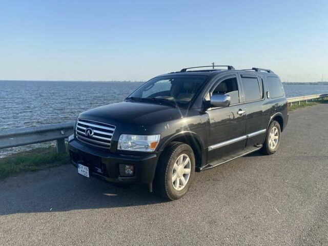 Чорний Інфініті QX56, об'ємом двигуна 5.6 л та пробігом 284 тис. км за 10000 $, фото 1 на Automoto.ua