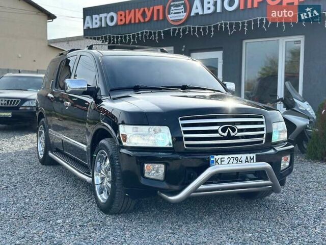 Черный Инфинити QX56, объемом двигателя 5.6 л и пробегом 235 тыс. км за 9499 $, фото 1 на Automoto.ua