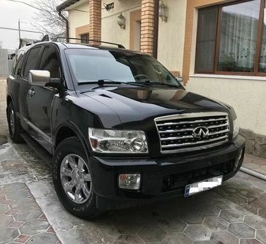 Чорний Інфініті QX56, об'ємом двигуна 0.56 л та пробігом 296 тис. км за 9000 $, фото 1 на Automoto.ua