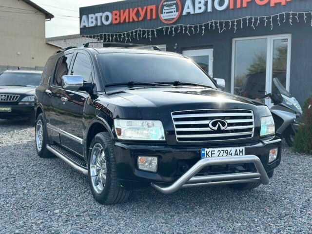Черный Инфинити QX56, объемом двигателя 5.6 л и пробегом 235 тыс. км за 9499 $, фото 1 на Automoto.ua