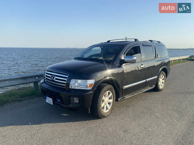 Чорний Інфініті QX56, об'ємом двигуна 5.6 л та пробігом 284 тис. км за 10000 $, фото 1 на Automoto.ua