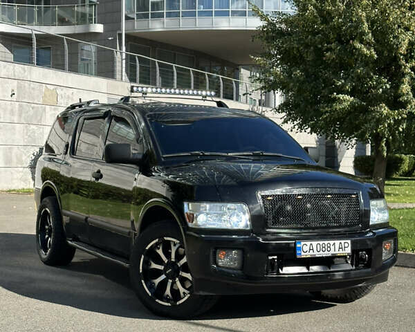 Черный Инфинити QX56, объемом двигателя 5.6 л и пробегом 250 тыс. км за 9890 $, фото 1 на Automoto.ua