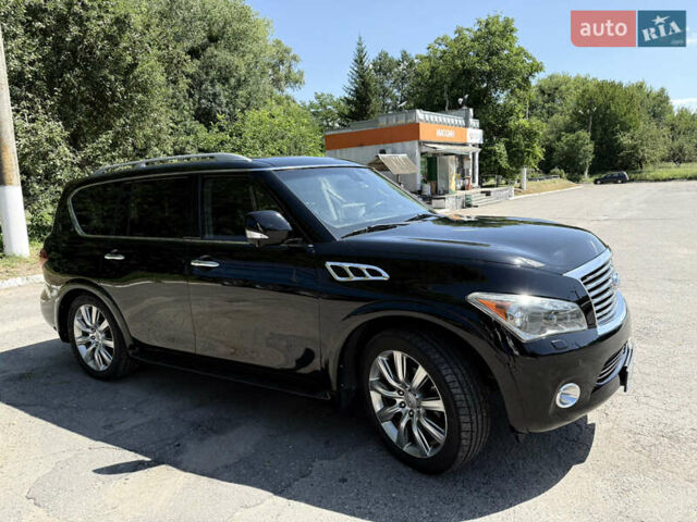 Черный Инфинити QX56, объемом двигателя 5.55 л и пробегом 255 тыс. км за 19000 $, фото 1 на Automoto.ua