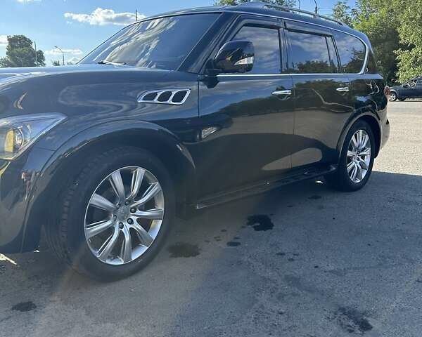 Черный Инфинити QX56, объемом двигателя 5.55 л и пробегом 123 тыс. км за 23500 $, фото 1 на Automoto.ua