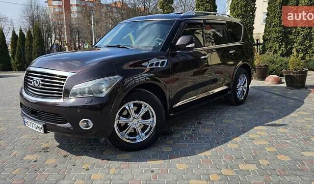 Коричневый Инфинити QX56, объемом двигателя 5.55 л и пробегом 265 тыс. км за 25000 $, фото 1 на Automoto.ua