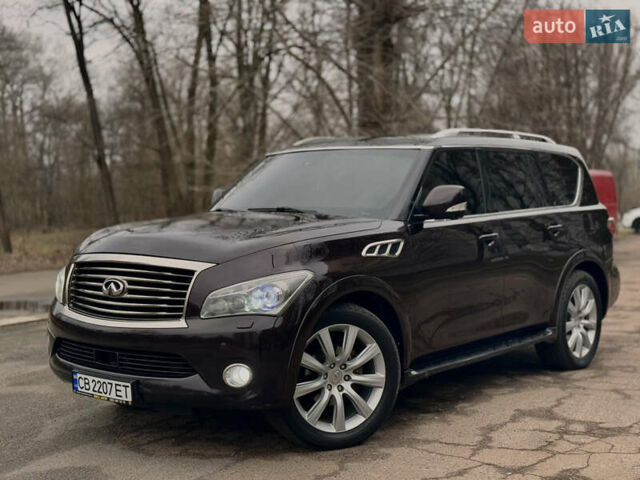 Червоний Інфініті QX56, об'ємом двигуна 5.6 л та пробігом 214 тис. км за 18800 $, фото 1 на Automoto.ua