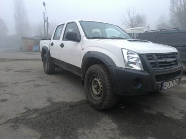 Білий Ісузу D-Max, об'ємом двигуна 2.5 л та пробігом 400 тис. км за 8416 $, фото 1 на Automoto.ua