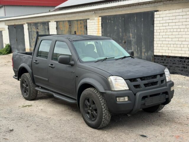 Чорний Ісузу D-Max, об'ємом двигуна 2.5 л та пробігом 200 тис. км за 3413 $, фото 1 на Automoto.ua