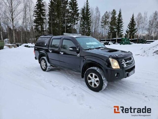 Чорний Ісузу D-Max, об'ємом двигуна 3 л та пробігом 296 тис. км за 7186 $, фото 1 на Automoto.ua