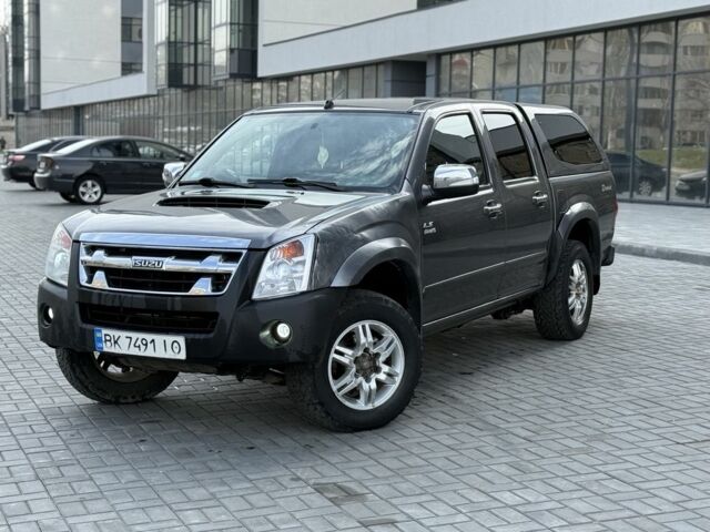 Сірий Ісузу D-Max, об'ємом двигуна 3 л та пробігом 325 тис. км за 6499 $, фото 1 на Automoto.ua
