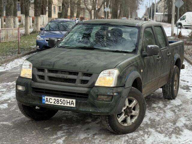 Зеленый Исузу Д-Макс, объемом двигателя 3 л и пробегом 287 тыс. км за 2850 $, фото 1 на Automoto.ua