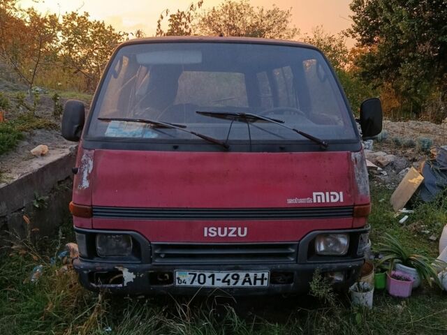 Ісузу Міді вант. 1992 у Кам'янське (Дніпродзержинськ) на Automoto.ua Червоний Ісузу Міді вант., об'ємом двигуна 2 л та пробігом 16 тис. км за 358 $, фото 1 на Automoto.ua