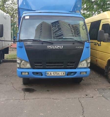 Синий Исузу НКР, объемом двигателя 4.57 л и пробегом 80 тыс. км за 11000 $, фото 1 на Automoto.ua