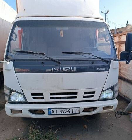 Белый Исузу НКР, объемом двигателя 5.2 л и пробегом 419 тыс. км за 15000 $, фото 1 на Automoto.ua