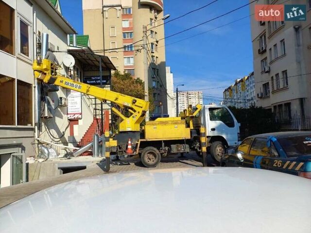 Белый Исузу НКР, объемом двигателя 4.7 л и пробегом 98 тыс. км за 32000 $, фото 1 на Automoto.ua