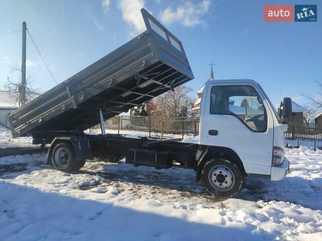 Белый Исузу НКР, объемом двигателя 4.57 л и пробегом 800 тыс. км за 16600 $, фото 1 на Automoto.ua