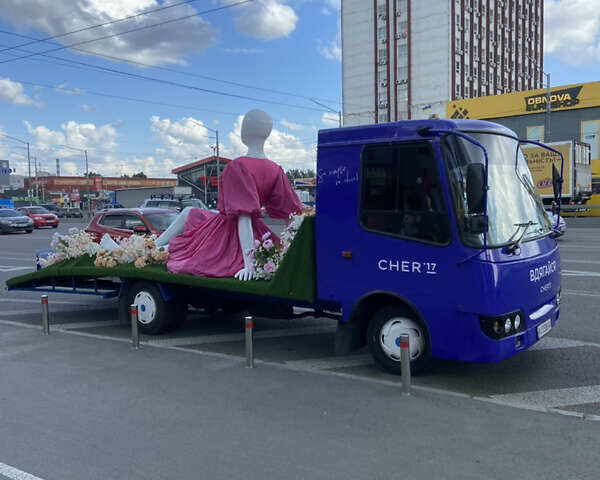 Желтый Исузу НКР, объемом двигателя 4.75 л и пробегом 356 тыс. км за 11999 $, фото 1 на Automoto.ua