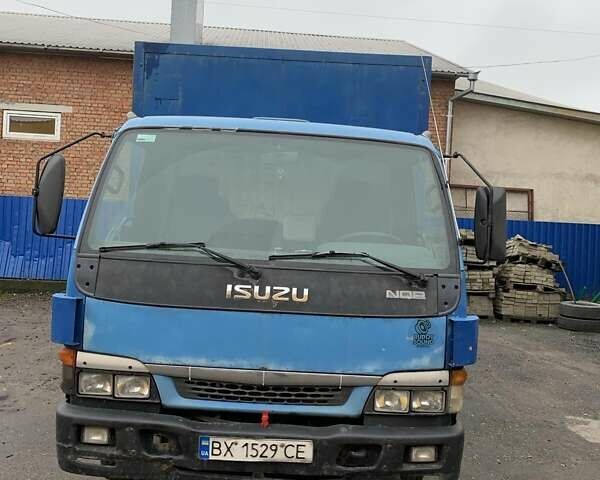Синий Исузу НКР, объемом двигателя 5.19 л и пробегом 740 тыс. км за 6000 $, фото 1 на Automoto.ua