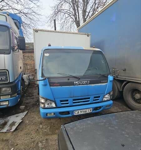 Синий Исузу НКР, объемом двигателя 5.19 л и пробегом 500 тыс. км за 12000 $, фото 1 на Automoto.ua