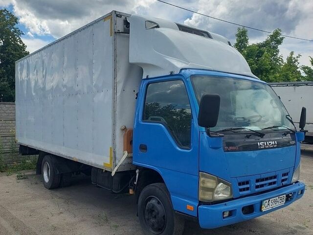 Синий Исузу НКР, объемом двигателя 4.57 л и пробегом 550 тыс. км за 8900 $, фото 1 на Automoto.ua