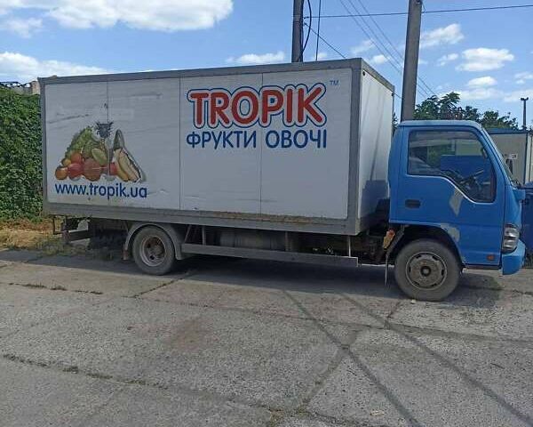 Синий Исузу НКР, объемом двигателя 5.19 л и пробегом 244 тыс. км за 11000 $, фото 1 на Automoto.ua