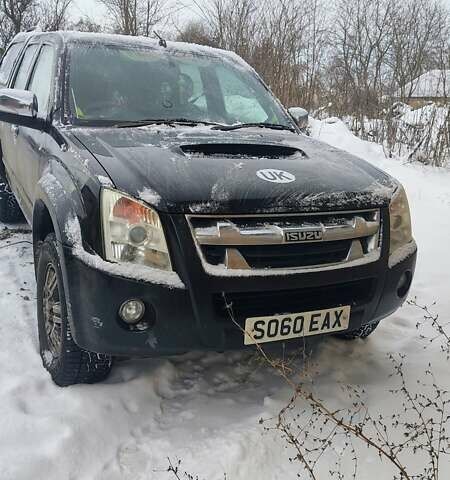 Черный Исузу Родео, объемом двигателя 2.5 л и пробегом 200 тыс. км за 4700 $, фото 1 на Automoto.ua