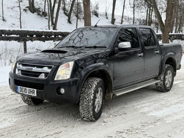 Черный Исузу Родео, объемом двигателя 2.5 л и пробегом 130 тыс. км за 6500 $, фото 1 на Automoto.ua