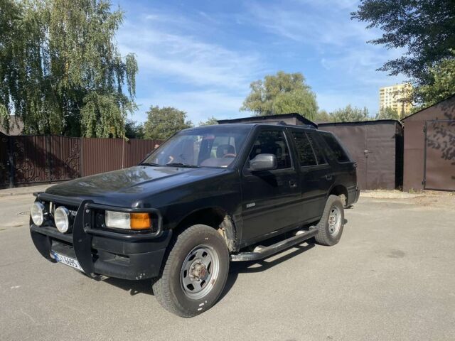 Черный Исузу Родео, объемом двигателя 3 л и пробегом 400 тыс. км за 2599 $, фото 1 на Automoto.ua