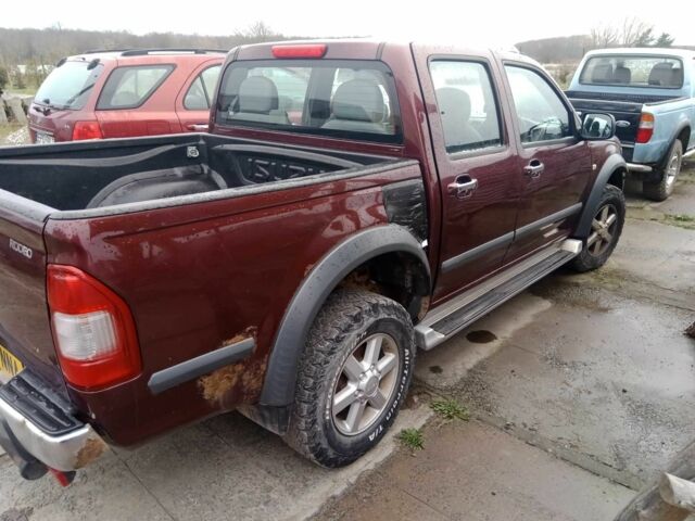 Червоний Ісузу Rodeo, об'ємом двигуна 3 л та пробігом 175 тис. км за 5196 $, фото 1 на Automoto.ua