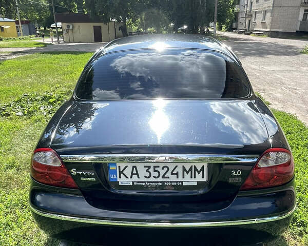 Черный Ягуар С-Тайп, объемом двигателя 2.97 л и пробегом 102 тыс. км за 9500 $, фото 1 на Automoto.ua
