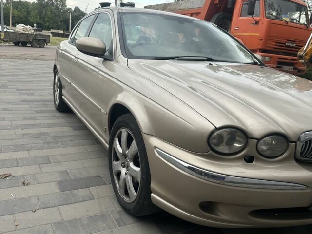 Бежевый Ягуар Х-Тайп, объемом двигателя 2 л и пробегом 253 тыс. км за 1500 $, фото 1 на Automoto.ua