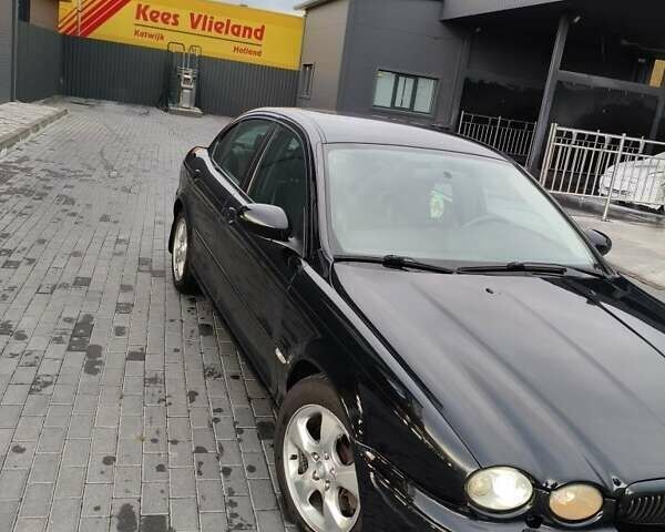 Черный Ягуар Х-Тайп, объемом двигателя 3 л и пробегом 240 тыс. км за 5312 $, фото 1 на Automoto.ua