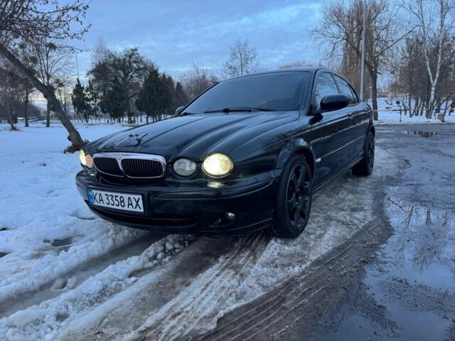 Черный Ягуар Х-Тайп, объемом двигателя 2.1 л и пробегом 145 тыс. км за 7500 $, фото 1 на Automoto.ua