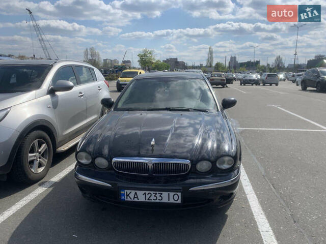 Черный Ягуар Х-Тайп, объемом двигателя 2.1 л и пробегом 266 тыс. км за 2555 $, фото 1 на Automoto.ua