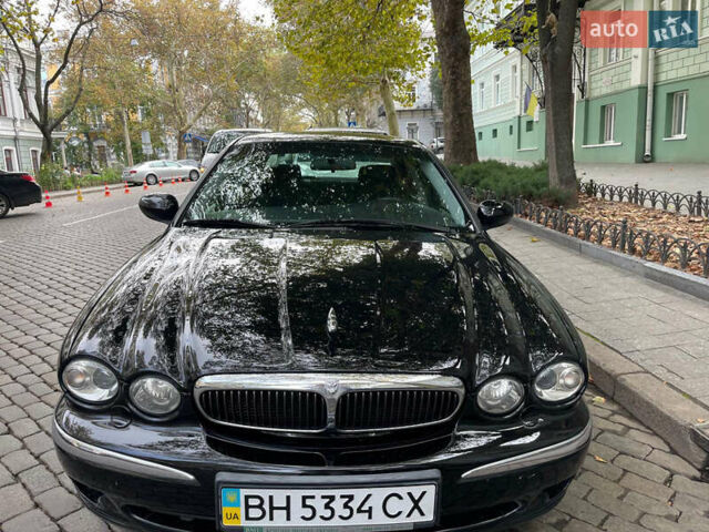 Черный Ягуар Х-Тайп, объемом двигателя 2.1 л и пробегом 137 тыс. км за 7500 $, фото 1 на Automoto.ua