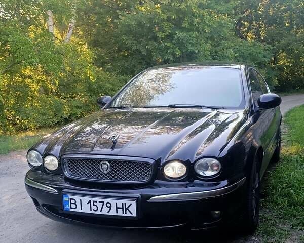 Чорний Ягуар Х-Тайп, об'ємом двигуна 2.1 л та пробігом 239 тис. км за 5000 $, фото 1 на Automoto.ua