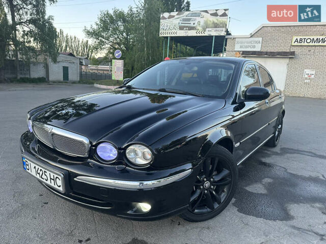 Черный Ягуар Х-Тайп, объемом двигателя 2.1 л и пробегом 200 тыс. км за 6600 $, фото 1 на Automoto.ua