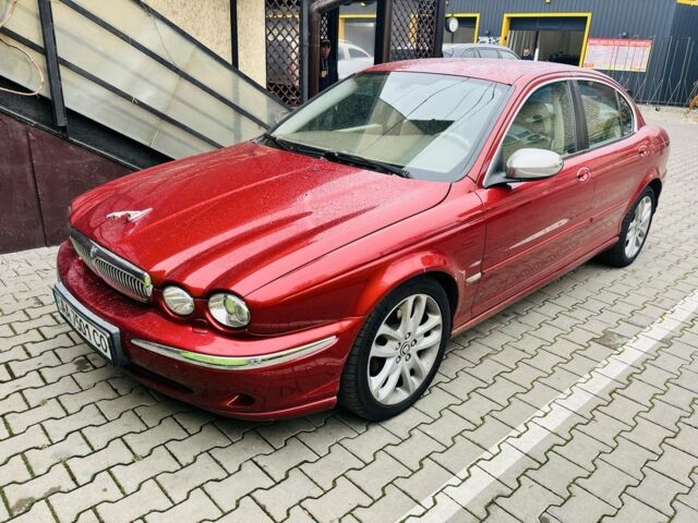 Красный Ягуар Х-Тайп, объемом двигателя 2.5 л и пробегом 237 тыс. км за 4250 $, фото 1 на Automoto.ua