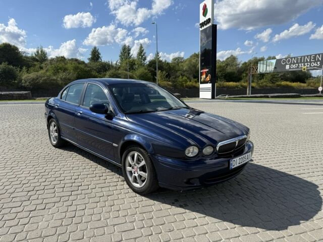 Синий Ягуар Х-Тайп, объемом двигателя 2 л и пробегом 295 тыс. км за 2999 $, фото 1 на Automoto.ua
