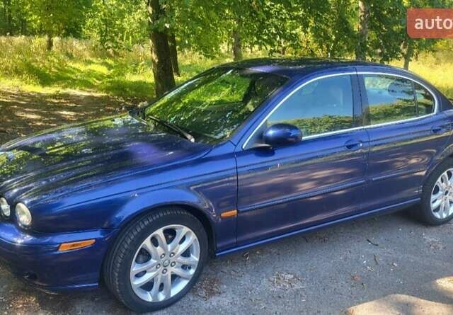 Синий Ягуар Х-Тайп, объемом двигателя 2 л и пробегом 168 тыс. км за 4000 $, фото 1 на Automoto.ua