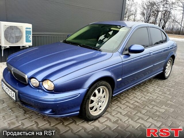 Синий Ягуар Х-Тайп, объемом двигателя 2 л и пробегом 238 тыс. км за 5700 $, фото 1 на Automoto.ua