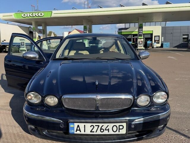 Синий Ягуар Х-Тайп, объемом двигателя 2 л и пробегом 207 тыс. км за 6800 $, фото 1 на Automoto.ua