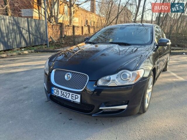 Черный Ягуар ХФ, объемом двигателя 2.97 л и пробегом 233 тыс. км за 9300 $, фото 1 на Automoto.ua