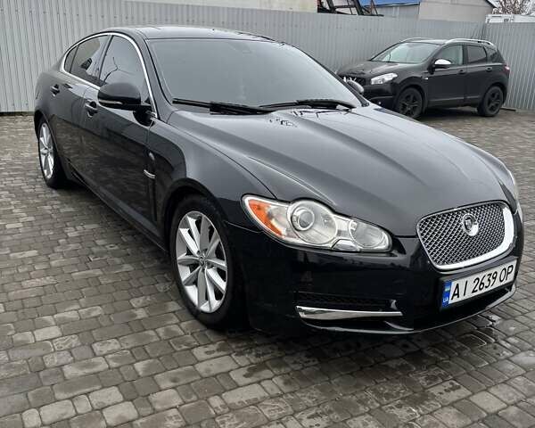 Черный Ягуар ХФ, объемом двигателя 2.99 л и пробегом 177 тыс. км за 12700 $, фото 1 на Automoto.ua