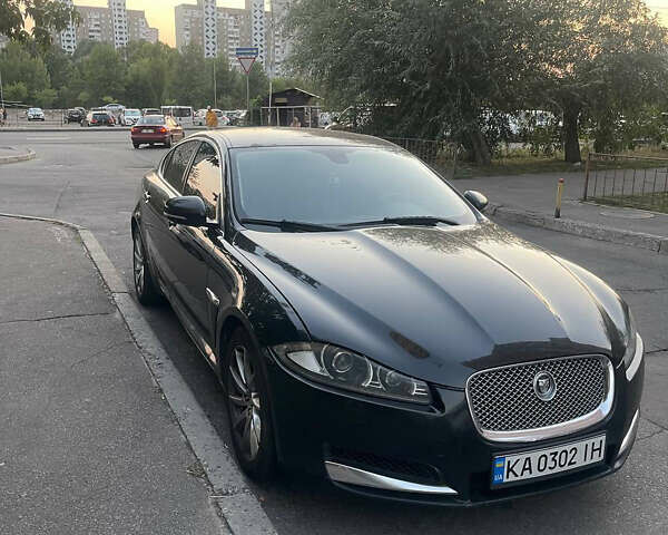 Черный Ягуар ХФ, объемом двигателя 2.18 л и пробегом 269 тыс. км за 14500 $, фото 1 на Automoto.ua