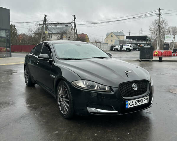 Черный Ягуар ХФ, объемом двигателя 2.97 л и пробегом 285 тыс. км за 9300 $, фото 1 на Automoto.ua