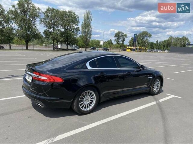 Черный Ягуар ХФ, объемом двигателя 3 л и пробегом 200 тыс. км за 13000 $, фото 1 на Automoto.ua